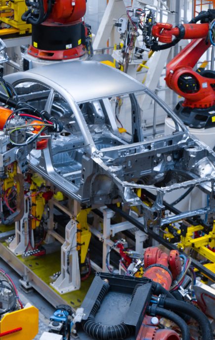 Assembly line production of new car. Automated welding of car body on production line. robotic arm on car production line is working